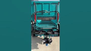 Real-life test shot of a three-disc towed manure spreader