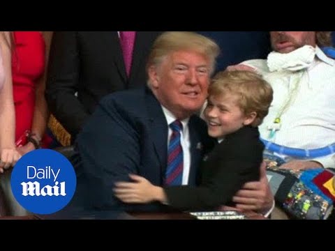 Young boy tries multiple times to give Trump a hug