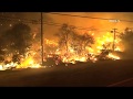 Residents flee as wildfires tear through California