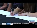 Crossing the T's and Dotting the I's: Two more athletes sign to continue their athletic careers
