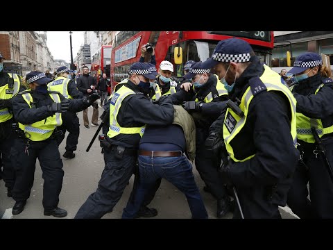 Aerial footage of scuffles between anti-lockdown protesters and police in London