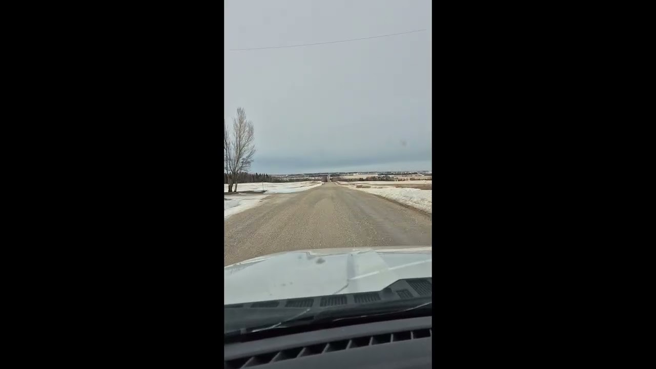 Driving down a country gravel road