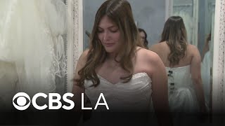 Bride-to-be gets free wedding dress after woman interrupted her proposal with racist outburst