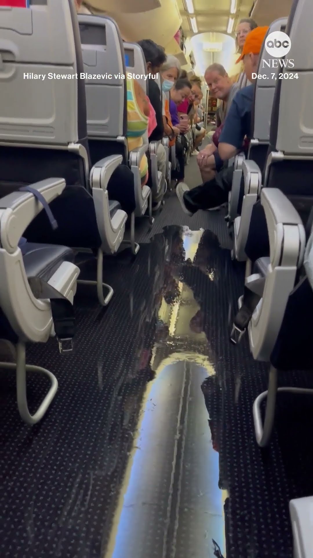 Water leak floods aisle on American Airline flight
