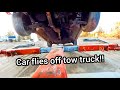 Tow truck loses car!   When pushing the limits goes wrong...