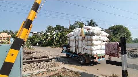 Crossing : Different Model EMU Local Trains at busy Railgate