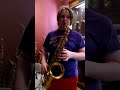 teenager playing a $15,000 saxophone