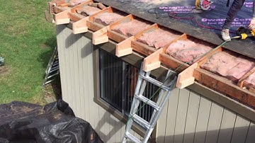 Brown roofing- Roof extended and vented soffit installed
