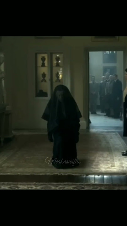 Queen Mary bowing to Queen Elizabeth II scene from The Crown