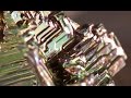 Melting bismuth crystals close up  oddly satisfying