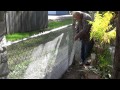 Converting my chain link fence to a stone wall