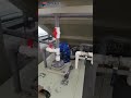 Powder coating system with bridge style oven