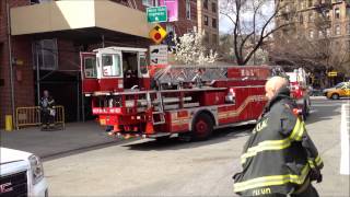 FDNY TILLER HOOK & LADDER TRUCK 5 RETURNING TO FIREHOUSE AFTER BUILDING ALARM IN LOWER MANHATTAN.