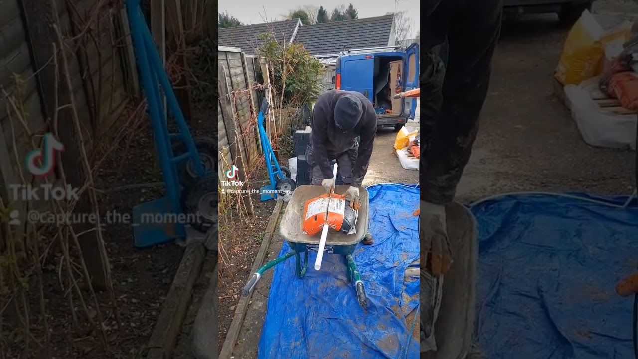 Teaching the labourer to open a cement bag 