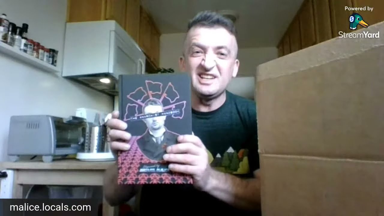 Signing the Limited Edition Anarchist Handbook hardcovers