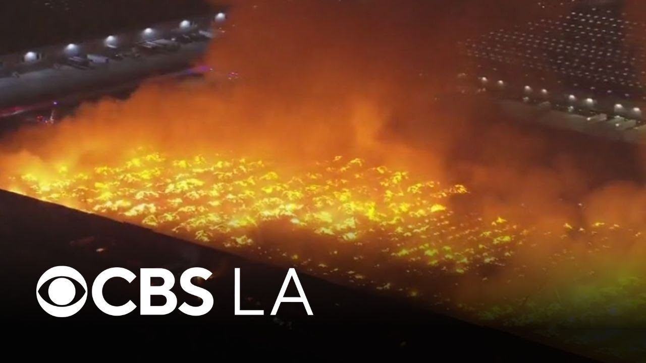 Crews battle massive warehouse fire in Ontario - YouTube