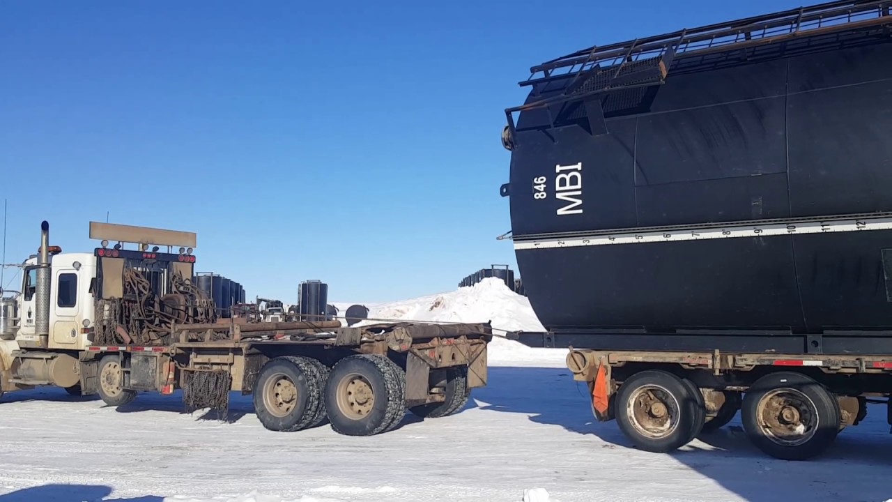 Unloading 400bbl upright tank.