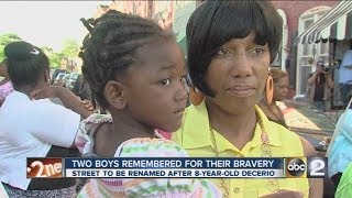 Vigil held for 8-year-old hero killed in fire, city to rename street