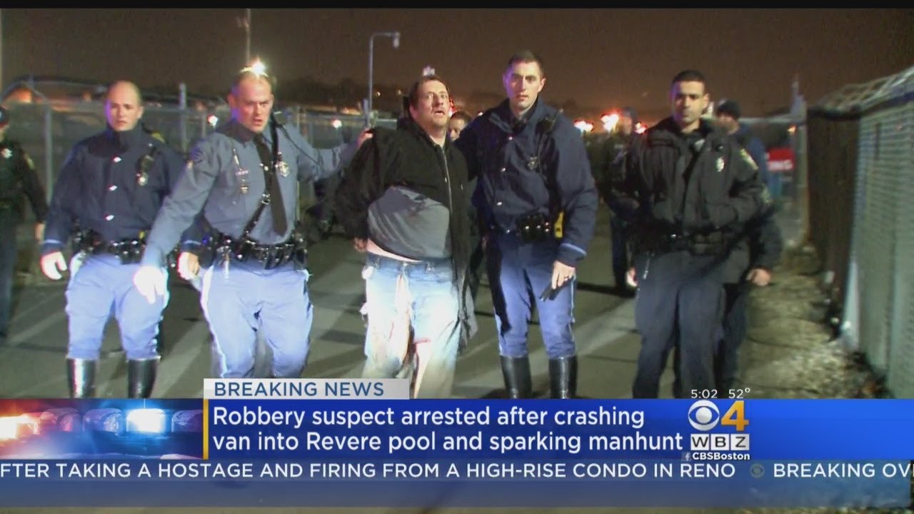 Robbery Suspect Captured After Manhunt, Crashing Van Into Pool