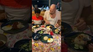 British family learning make nasi lemak and bubur jagung at malaysian home. So far they are happy