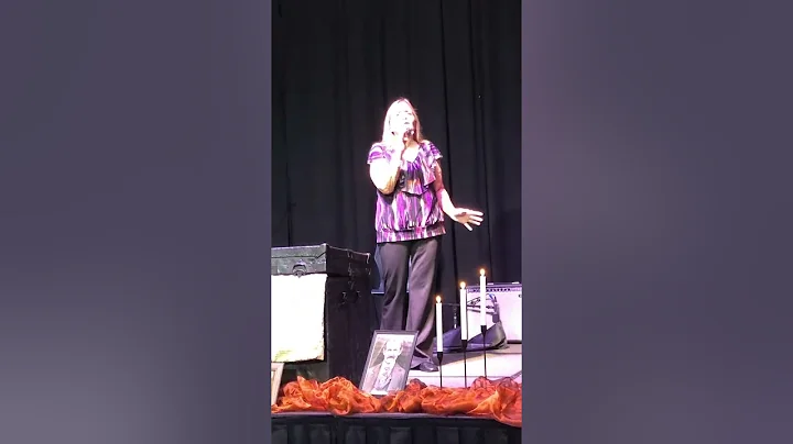 Janice singing How Beautiful in competition.