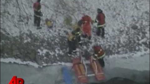 Raw Video: Dog Rescued From Icy River