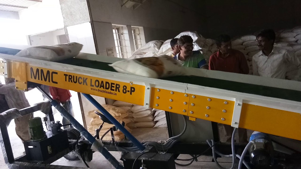 MMC Truck Loading Conveyor 8P Extended 25 Kg Bags Gujarat - YouTube
