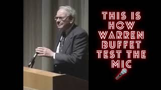 Warren Buffet checking the mic