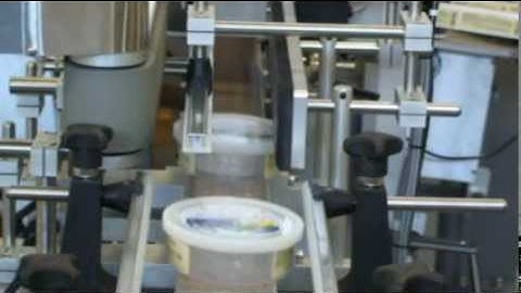 Model 1600, top, front & back taper label application