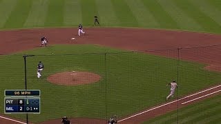 Herrera barehands grounder, fires to first