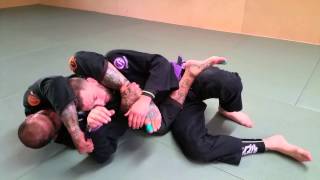Armbar from failed triangle from the back
