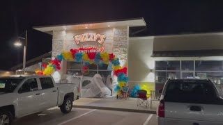 Customers camp overnight for Fuzzy s Taco Shop on West Adams grand reopening