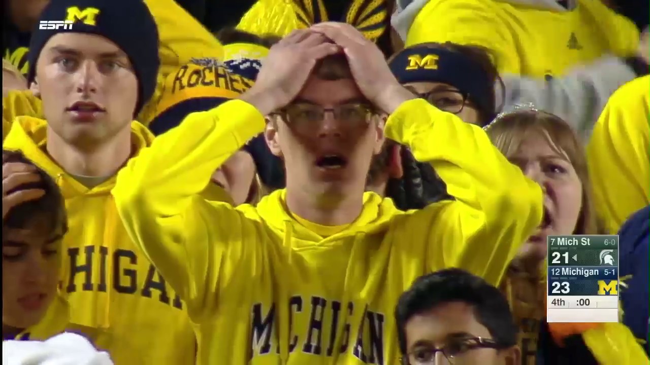 Michigan blocks out outside noise, blows out rival Michigan State