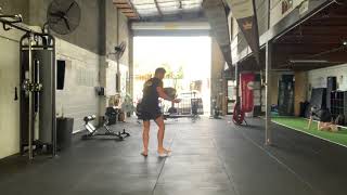 Sandbag Overhead Throw demonstration