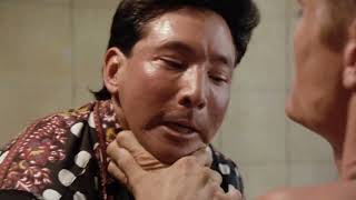 Yakuza dude breaks his own neck to avoid squealing to Japanese-speaking Dolph Lundgren about boss