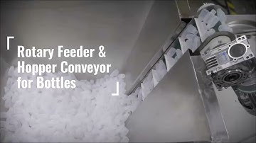 Elevate Efficiency: Explore Our Rotary Feeder & Hopper Conveyor for Bottles. 🔥
