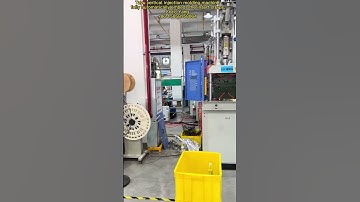 TAYU vertical injection molding machine fully automatically embeds the insert straps