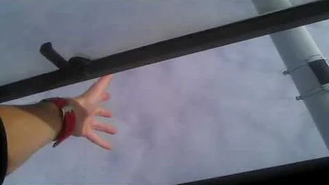 Putting my hand out the window of an airplane during flight