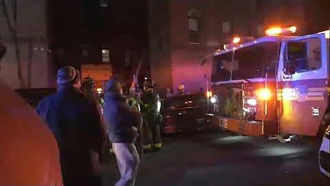 Scorched wood, shattered glass left behind in Queens fire killing 80-year-old woman