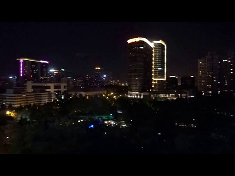 Aruna & Hari Sharma enjoying night view 10th floor Rosedale Hotel & Suites Beijing, Apr 26, 2017