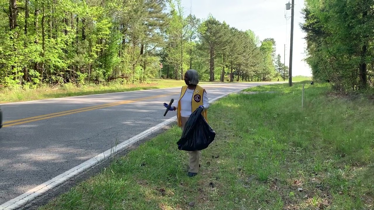 Roadside Service: Eleanor Edwards picks up trash along Buddy Faust Road