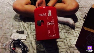 Unboxing the Coca-Cola mini fridge from Walmart