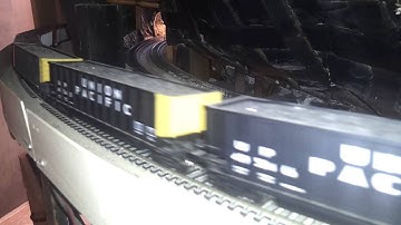 HO Scale CSX Genset Leads A Coal Train Through A Tunnel