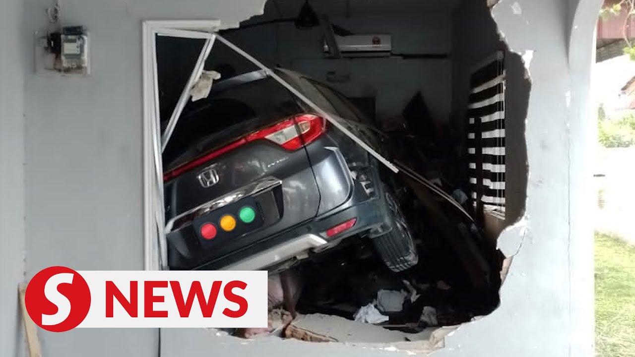 Car crashes into house, driver and son escape with minor injuries - YouTube