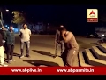 Police beat accused in dhoraji after accused beat woman watch
