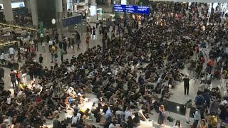 Hong kong protesters kick off three-day airport rally | afp