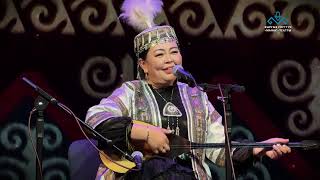 картинка: Кутман Садыбакасов менен Жылдыз Кожобекованын айтышы.