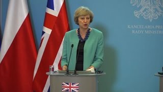 Details British PM seeks to reassure Poles in post-Brexit UK Guide