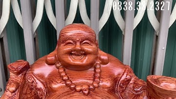 Tượng phật di lặc ngồi cầm như ý rộng 40cm và 50cm chất liệu gỗ hương đá nam phi