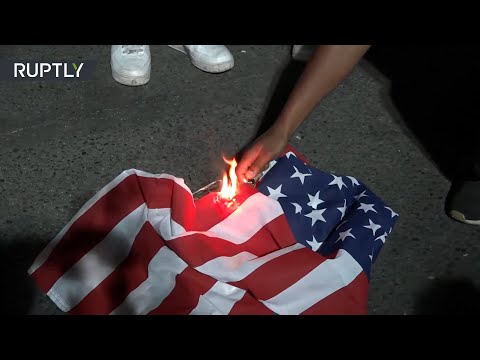 'F*ck Trump!' | Bible and US flag set alight on 65th night of protests in Portland